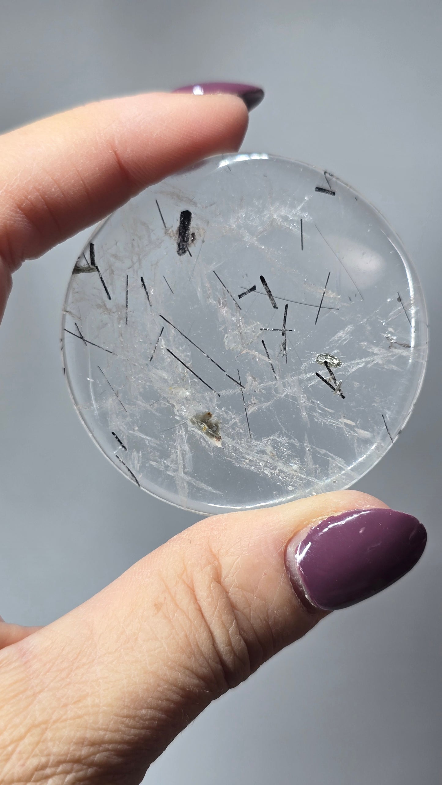 Collectors Grade Clear Quartz with Tourmaline Rutile and Mica Cabachon Disc